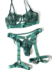 Darlene emerald green bra and harness thong, flat-lay product view