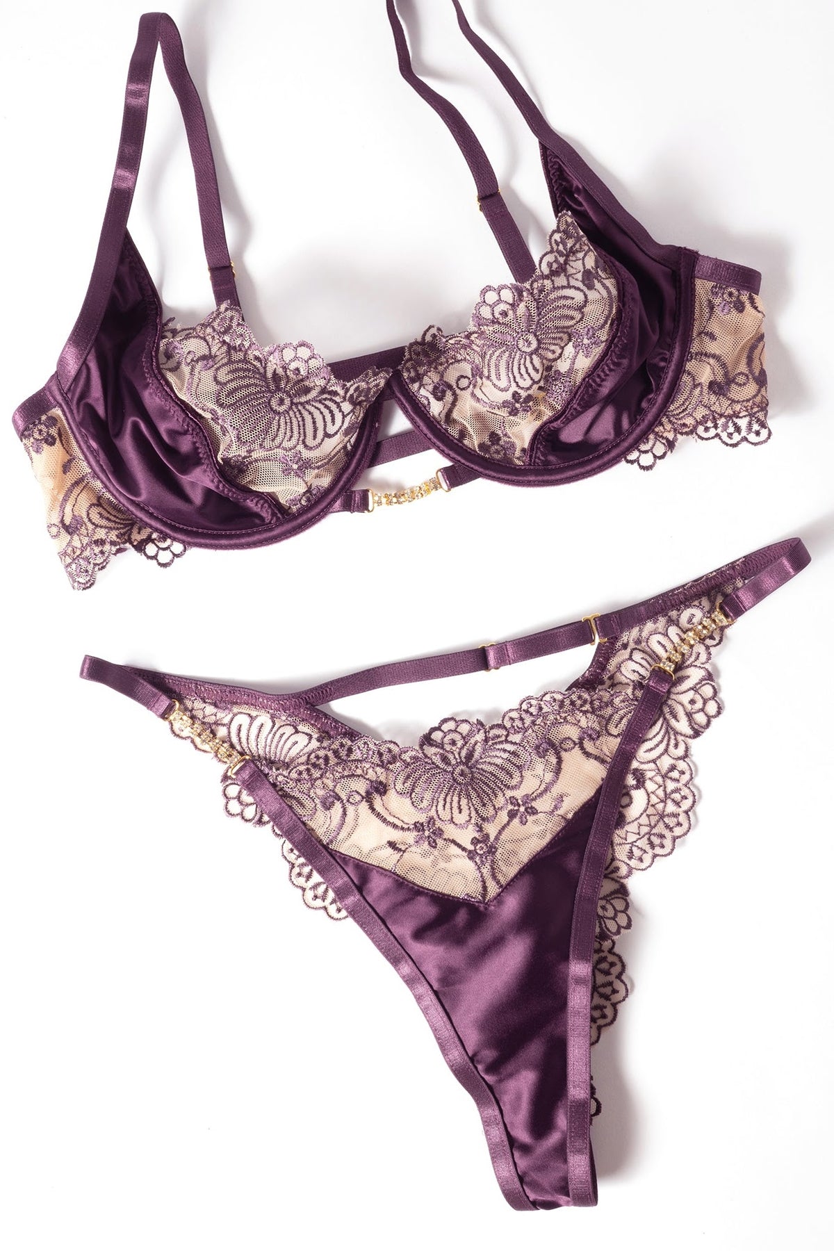 Loretta burgundy lace and satin bra and thong laid flat